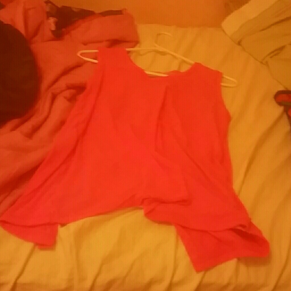 A pink tek gear shirt